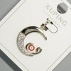 Pendentif «Œil de la Lune» Xuping avec strass blancs et émail rouge, diamètre environ 18,5 × 19,5 mm, longueur environ 26 mm, rhodié