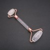 Rouleau de massage en pierre naturelle cristal de roche, longueur 14,5 cm, couleur cuivre des éléments métalliques