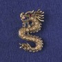 Broche-pendentif «Dragon» avec strass jaunes, métal doré 40 × 23 mm +