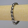 Bracelet en hématite ovale noir, diamètre 13×8 mm ±, longueur 18 cm ±, élastique