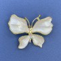 Broche «Papillon» strass blancs sur métal doré, diamètre environ 44 mm, longueur environ 33 mm