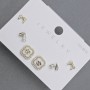 Puces d'oreilles en métal doré avec strass blancs - trèfle à quatre feuilles, 10 mm+