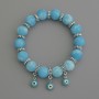 Bracelet en larimar, perles lisses d'environ 10 mm de diamètre, avec inserts métalliques, longueur 18 cm (élastique)