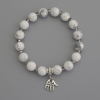 Bracelet en howlite, perles rondelles de 8 mm (+-), cristal tchèque en rondelles 3,5×3 mm (+-), longueur 18 cm (+-), élastique