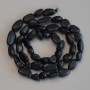 Perles de schungite en forme de galette, diamètre 7–10 × 8 mm, longueur 40 cm environ sur fil