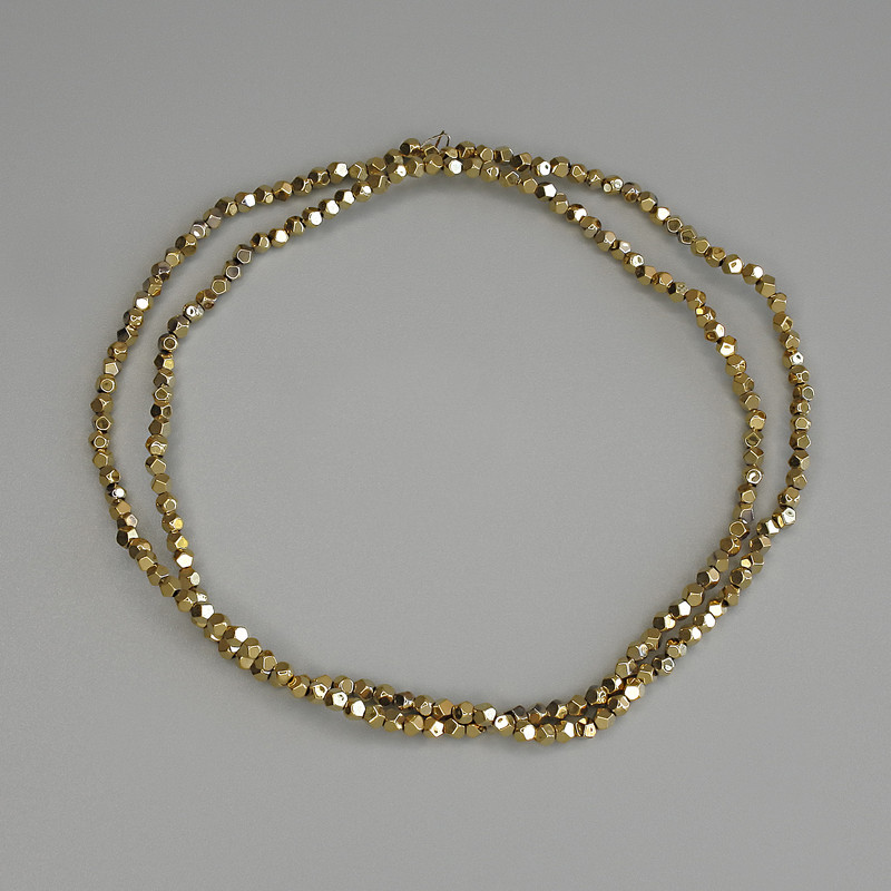 Perles d'hématite dorées, facettées, diamètre 2 x 2 mm ±, sur fil, longueur 40 cm+