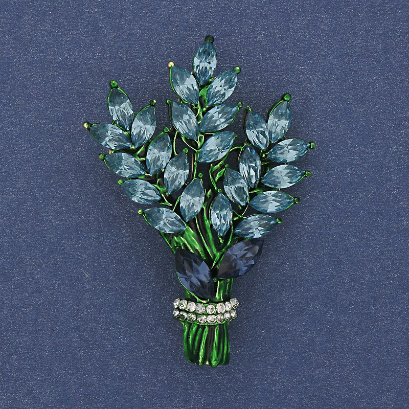 Broche «Brin» bleu clair et blanc strass en métal doré 43×29 mm +