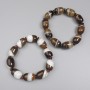 Bracelet en agate barillet, diamètre 18×13 mm ±, rondelles 6×3 mm ±, longueur 18 cm ±, élastique