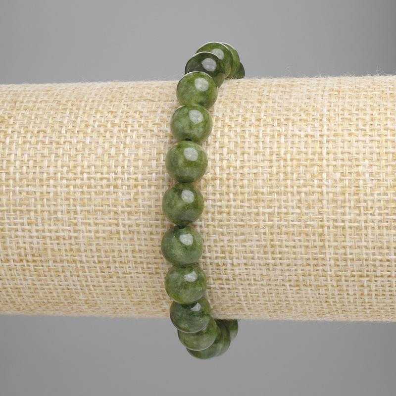 Bracelet en jadéite – boules lisses 8 mm (+/-) – longueur 18 cm – élastique