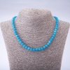 Collier en pierres teintées synthétiques «Aigue-marine» — billes facettées, diamètre 6 mm, longueur 45 cm