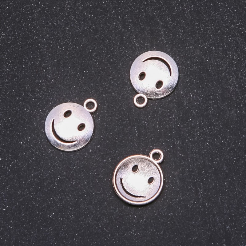 Fourniture pour pendentifs « Sourire » 15×18 mm conditionnement 20 grammes ± 20 pièces