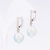 Boucles d'oreilles «Élégant» en pierre de lune, diamètre 14 mm, longueur 3 cm