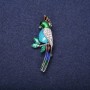 Broche perroquet émaillée avec strass, multicolore (bleu, bleu clair, vert et blanc), 50×20 mm, métal argenté