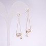 Boucles d'oreilles pendantes série 925, strass blancs, métal doré, dimensions 48×9 mm
