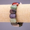 En réduction. Bracelet assorti de pierres naturelles, maillons 18×14 mm ±, longueur 18 cm, sur élastique