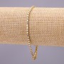 Bracelet à strass à fermoir, à rang unique, couleur métal « or », longueur 20 cm, largeur 3 mm