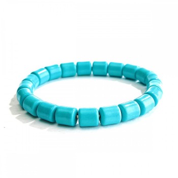 Bracelet élastique en turquoise bleu clair — pierres cylindriques 8×5×9 mm (+-)
