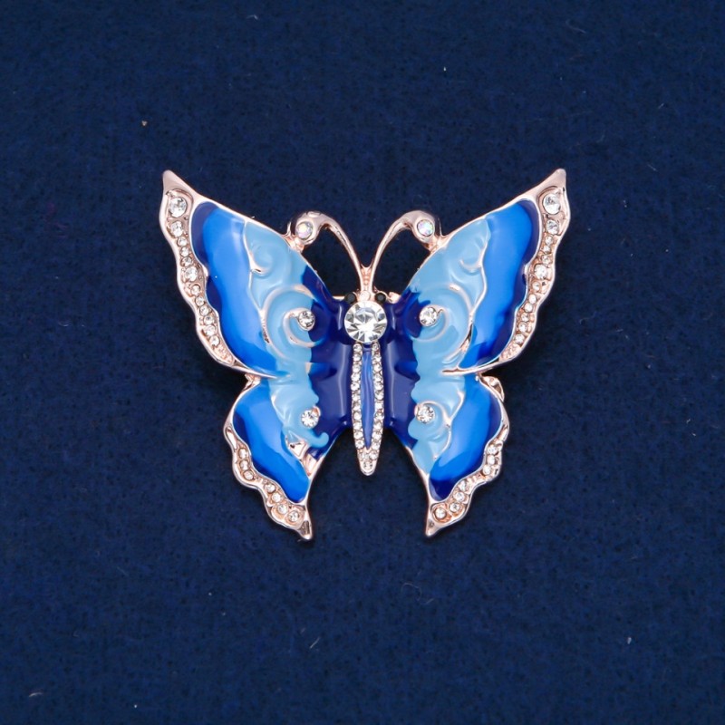 Broche Papillon, strass blancs, émail bleu clair et bleu, métal doré, 47 × 52 mm +
