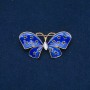 Broche Papillon en métal doré, émail et strass blanc 48×24 mm +