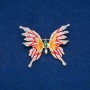 Broche papillon en métal doré, émail et strass blancs et verts 42 × 50 mm +