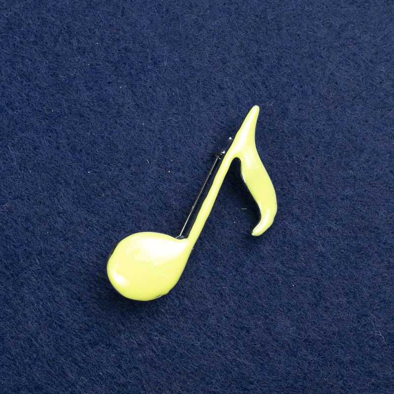 Broche «Note» argentée, métal argenté et émail 25 × 45 mm +