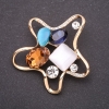 Broche «Étoile de mer» avec des cristaux multicolores 55 × 55 mm métal jaune