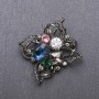 Broche « Ordre de beauté » avec cristal bleu, 51×48 mm, métal noir