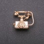 Broche Téléphone en métal jaune 27 × 24 mm