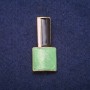 Broche «Laqué» vert, émail noir et blanc, métal doré 18x39 mm
