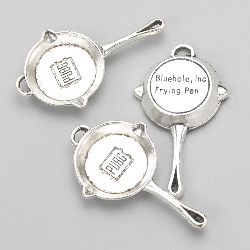 Pendentif Poêle 34×20 mm, conditionnement 8 pièces ± 20 g